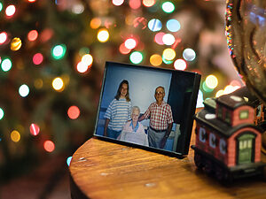 Framed family photo in a home decorated for Christmas