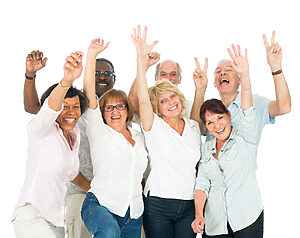 raising hands and smiling