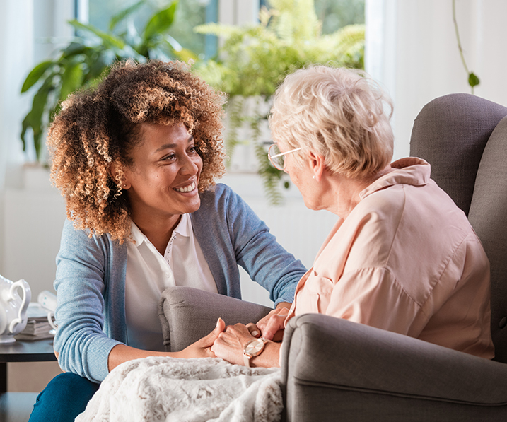 Employee with senior woman