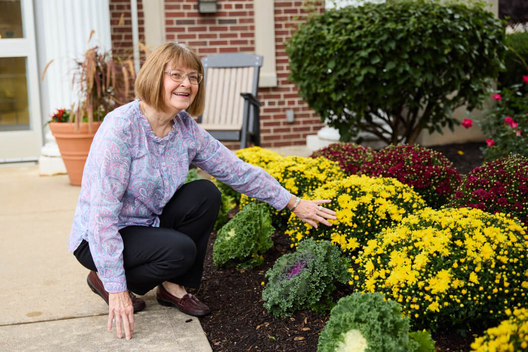 Senior woman showing off her mums