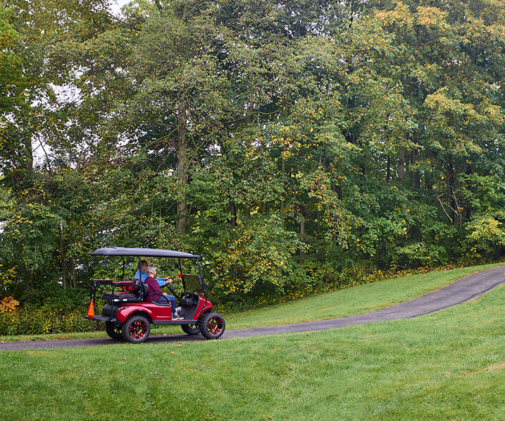 Driving a golf cart on the golf course