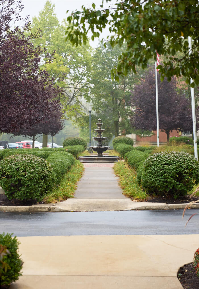 Garden fountain down path