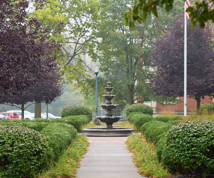 Garden fountain down path