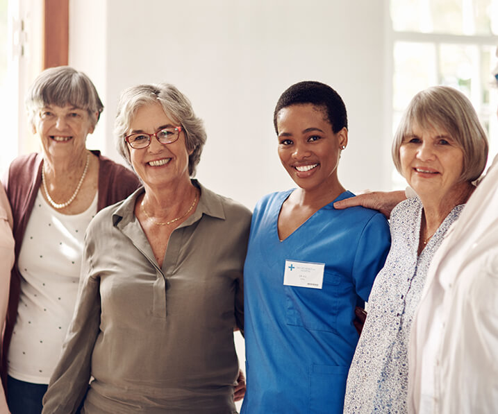 Nurse posing with residents