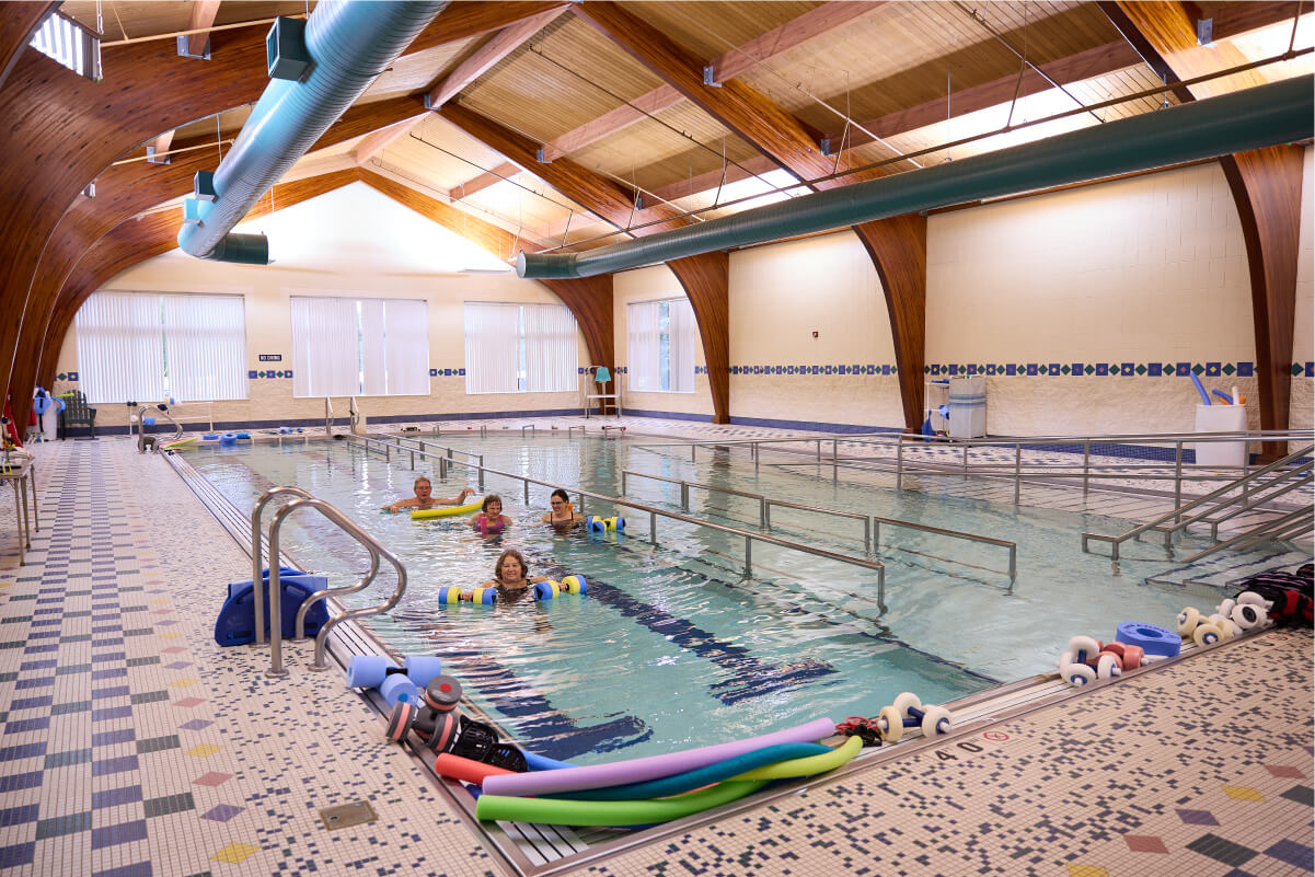 Pool with seniors exercising