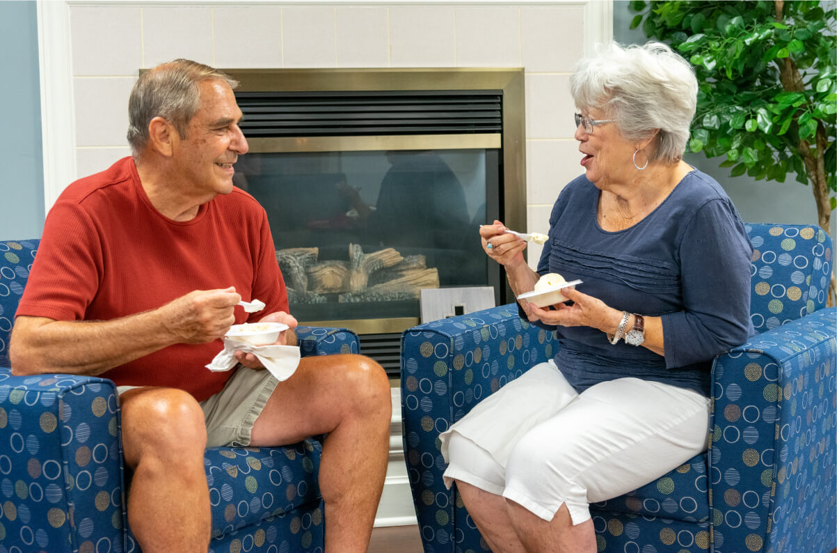 Two residents eating ice cream