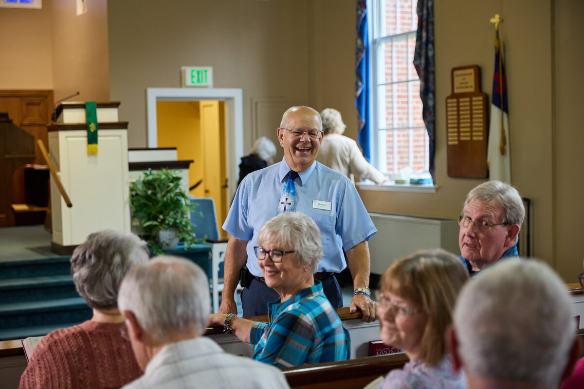Seniors laughing at church