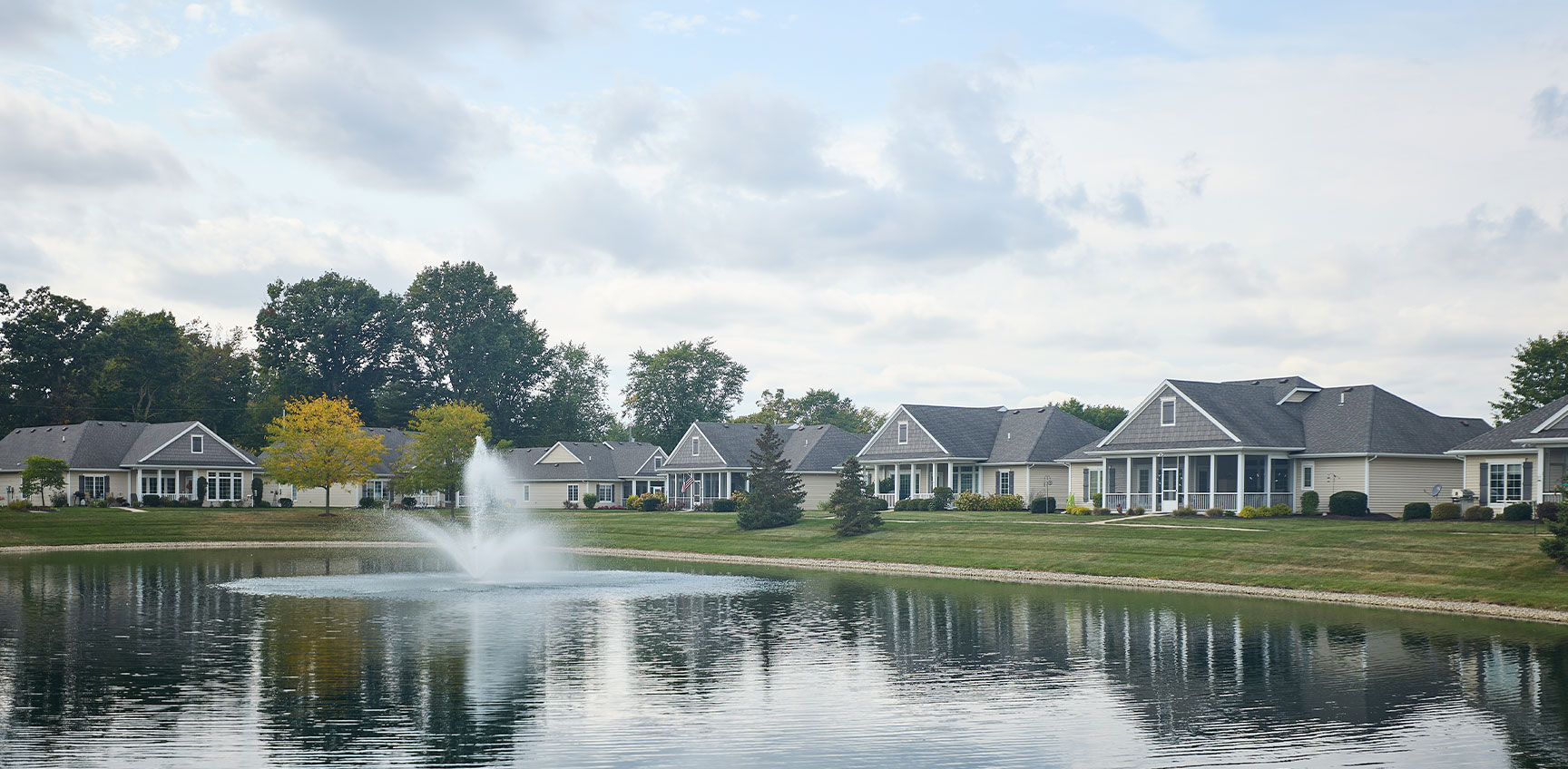 Community pond with decorative fountain