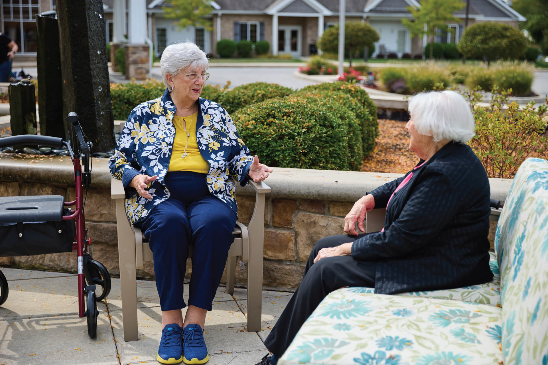 Two women sitting outside talking