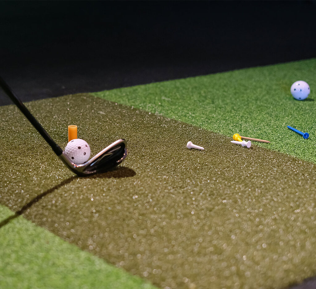 Close-up shot of someone golfing