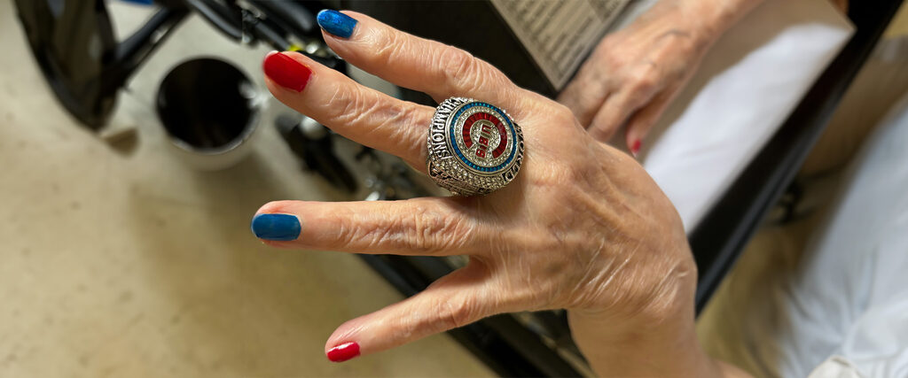 Senior resident wearing Cubs ring