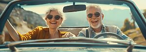 Retired couple cruise in a classic car