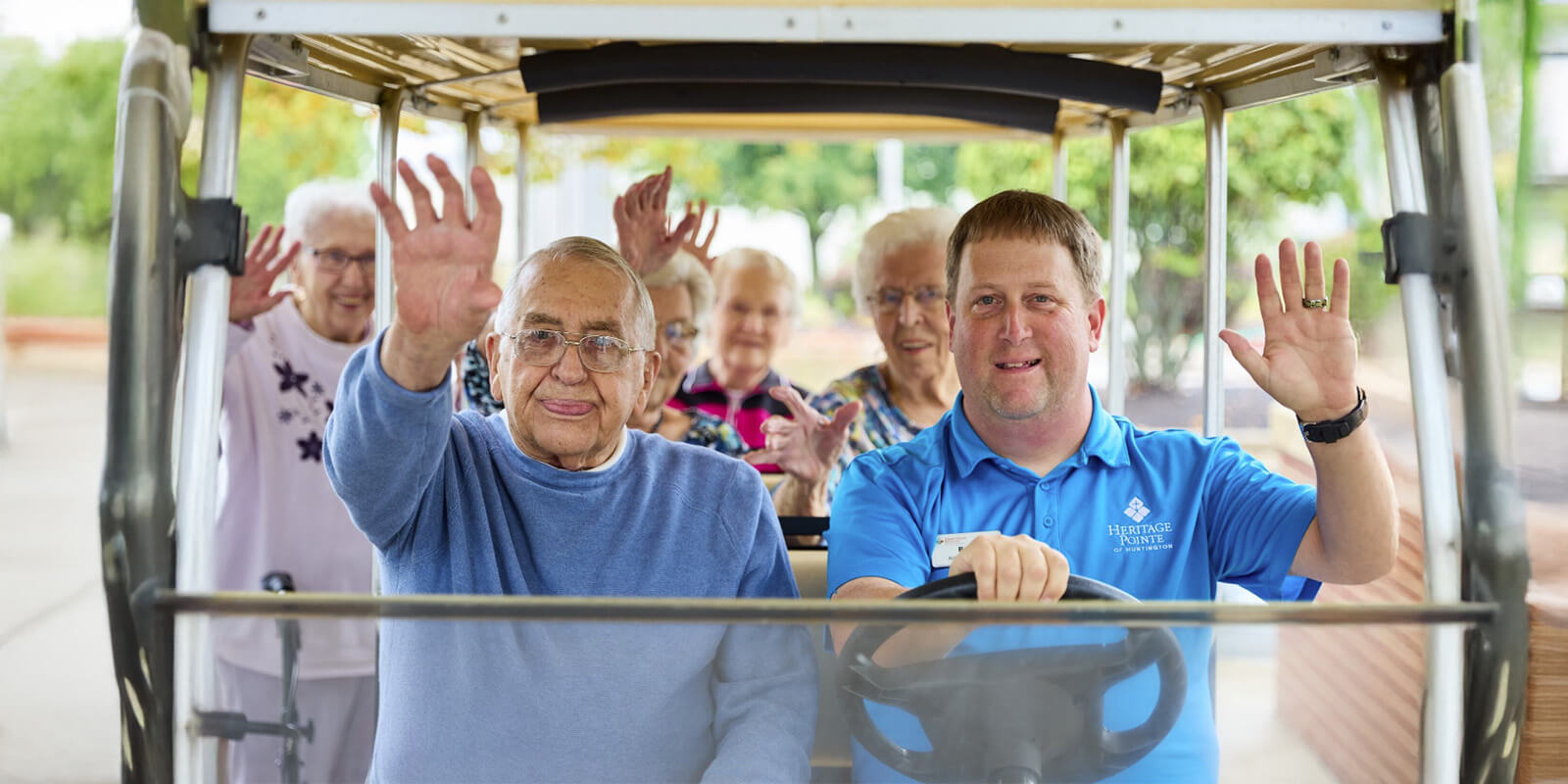 Seniors on a golf cart outing at Huntington