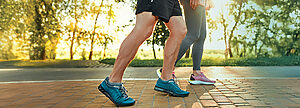 Close up of seniors jogging outdoors