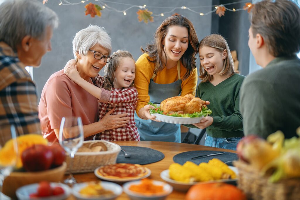 Happy family enjoying thanksgiving dinner