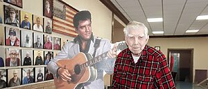 Victor Gessler stands with Elvis cut out