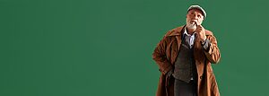 Senior dressed as detective