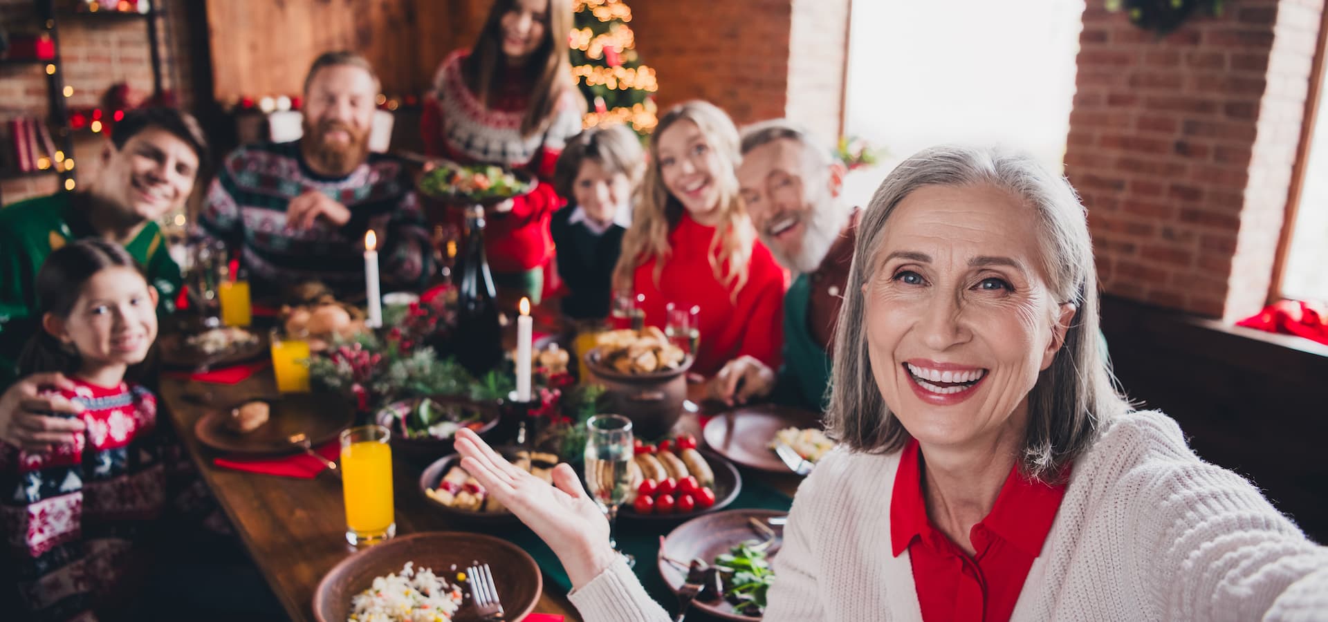 Family gathered around table for Christmas meal