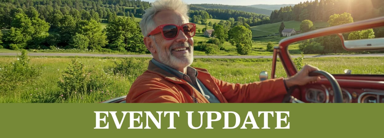 Senior man cruising in car on sunny day Event Update