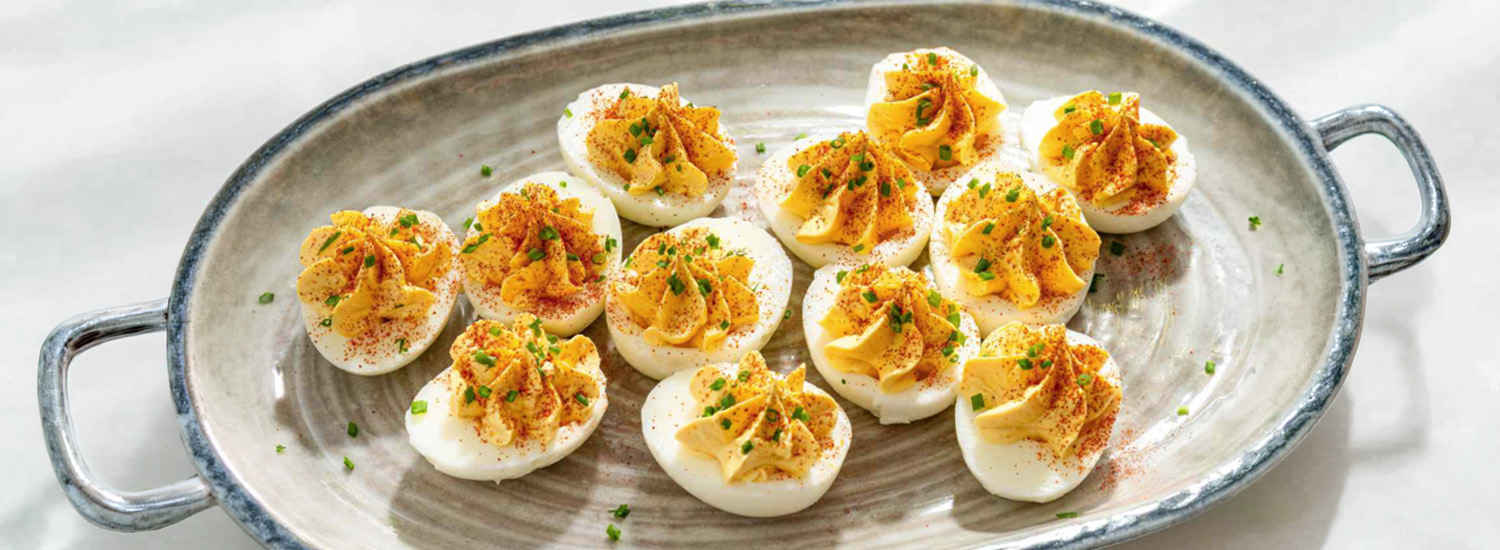 Deviled eggs plated and garnished